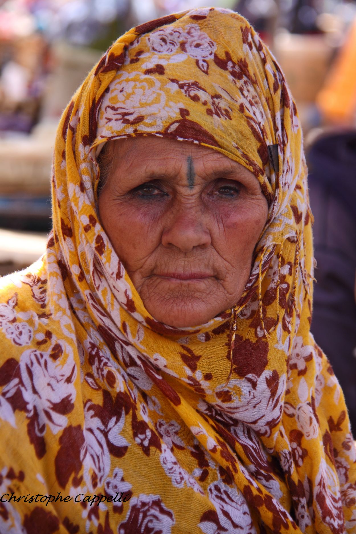 An old woman at Bab Ftouh square